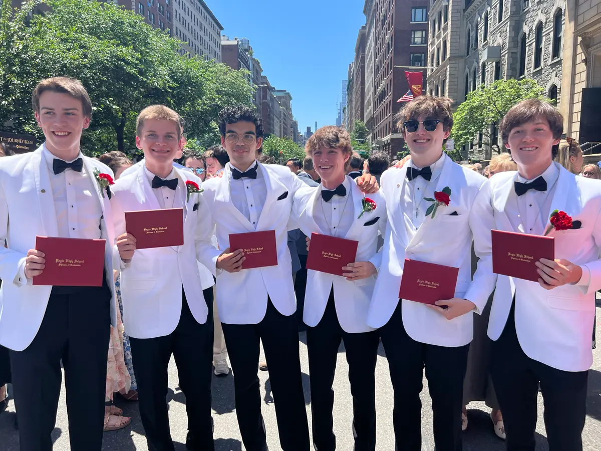 Five Students with their diplomas.